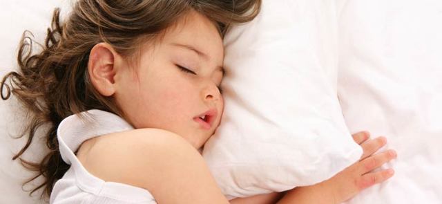 Почему ребенок скрипит зубами во сне